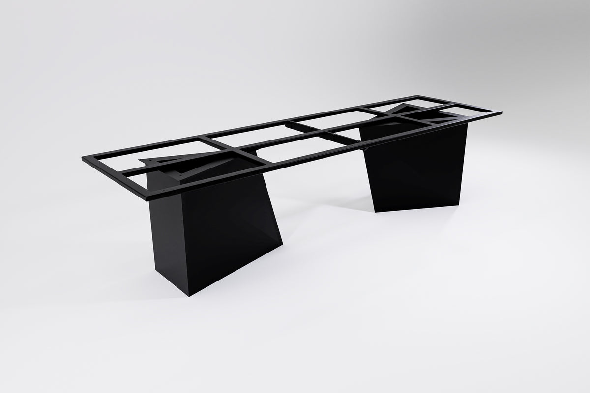A modern table base with a geometric design, constructed from black steel with visible sub-frames and legs.
