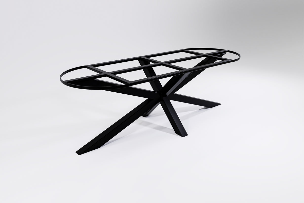 A black, heavy-duty metal table base designed to support oblong/elongated shaped tabletops, with a x-shaped design by tilia creations
