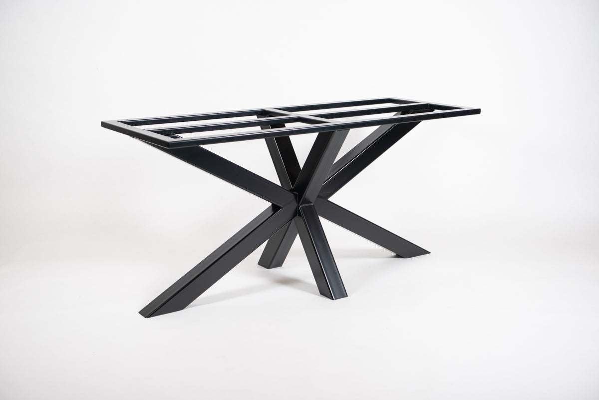A heavy-duty black steel table base with an X-shaped design, suitable for supporting stone table tops.