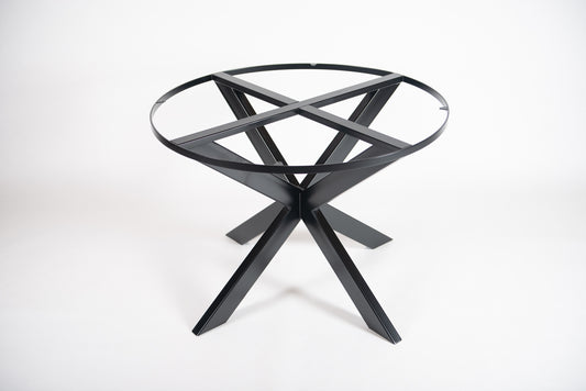 A black metal table base with a circular shape designed to support a stone tabletop.